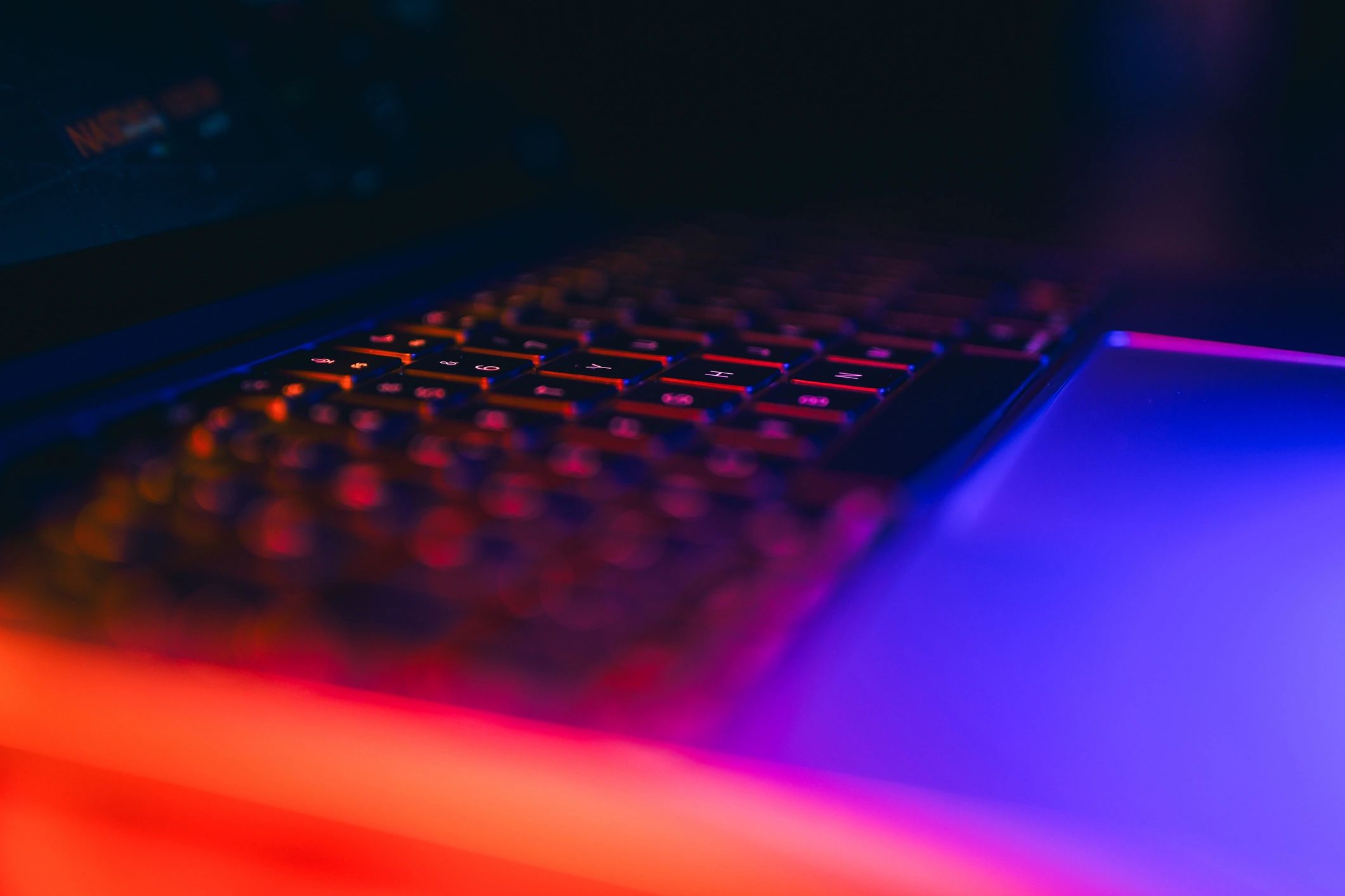 Neon-lit gaming keyboard for BattleLuck download page